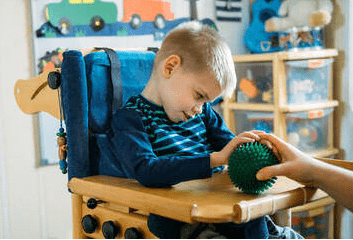Boy making a choice with a ball